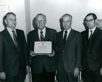 Bayard H. Faulkner receives an award