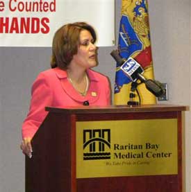 Woman Speaking at Podium